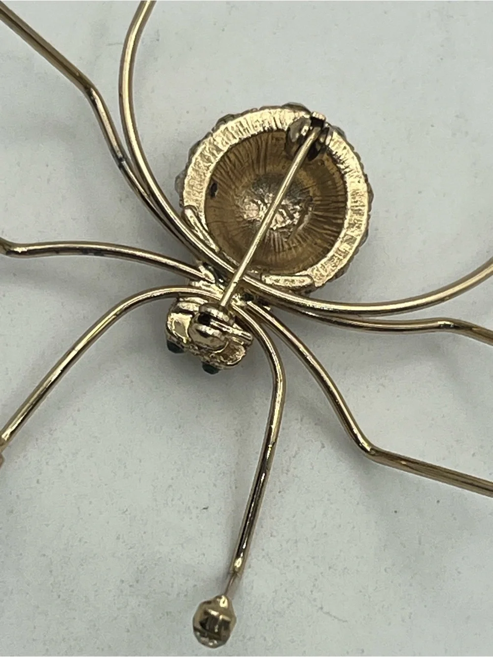 Spider insect gold tone clear rhinestone brooch pin